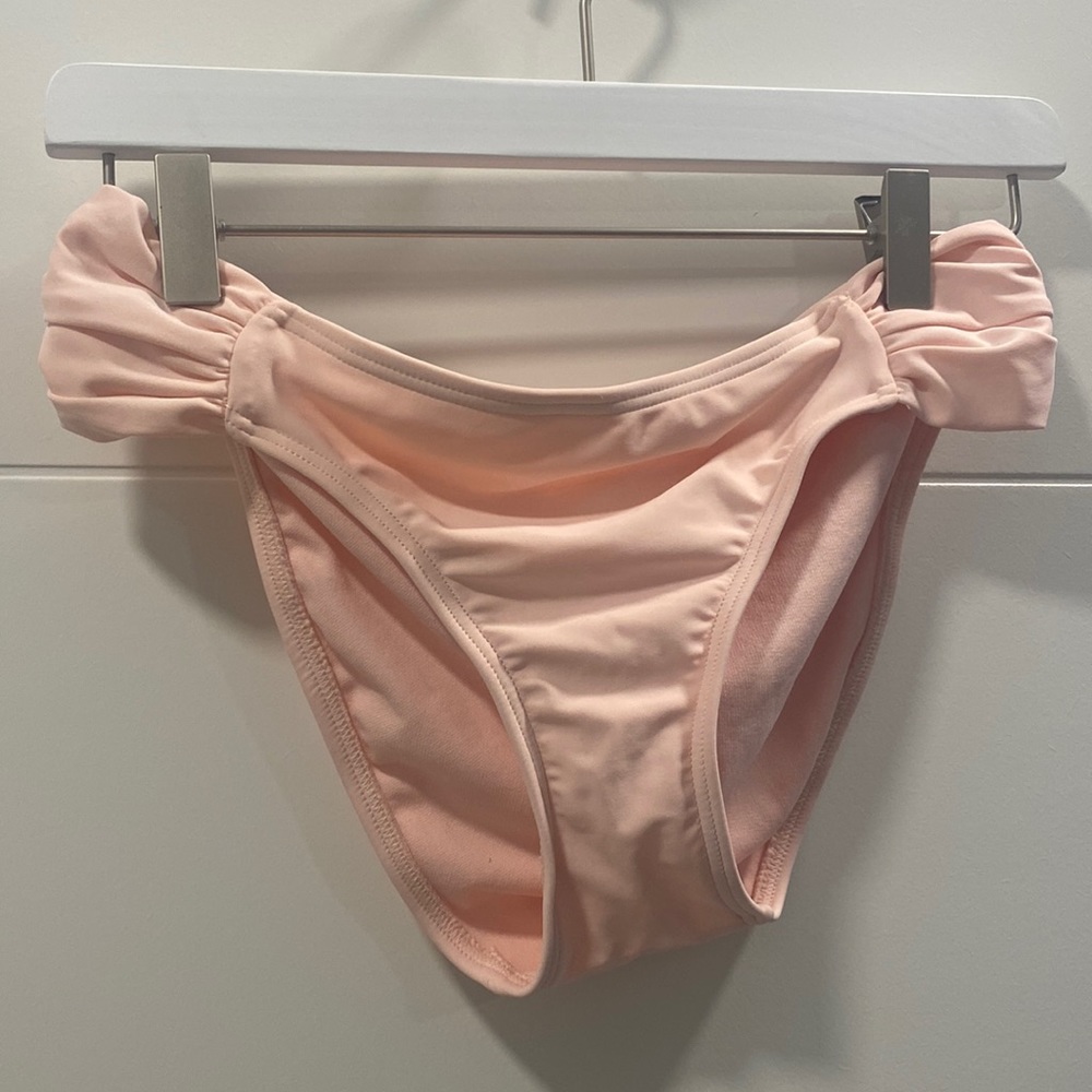 Xhiliration light pink bikini bottoms. Size M.